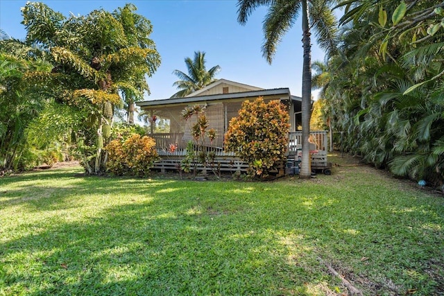 view of yard featuring a deck