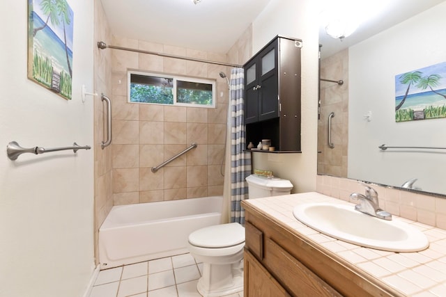 full bathroom featuring toilet, shower / bath combo, vanity, and tile patterned floors