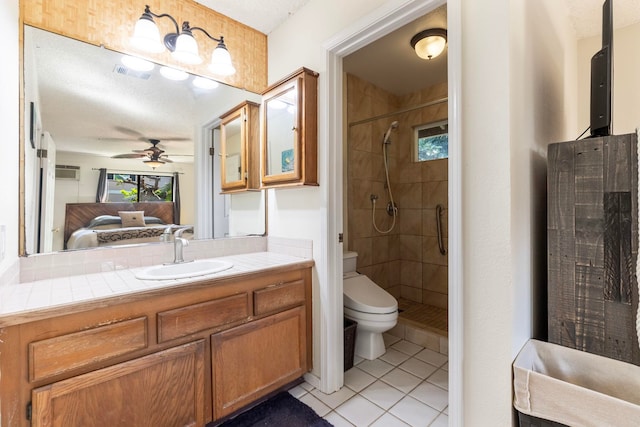 ensuite bathroom featuring toilet, a shower stall, visible vents, and connected bathroom