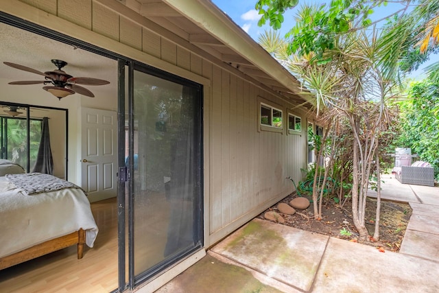 exterior space with a patio area and a ceiling fan