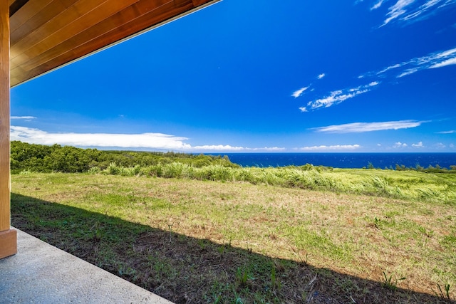 view of yard with a water view