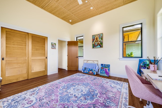 office space featuring wooden ceiling and dark wood-type flooring