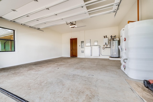 garage with water heater, a garage door opener, and electric panel