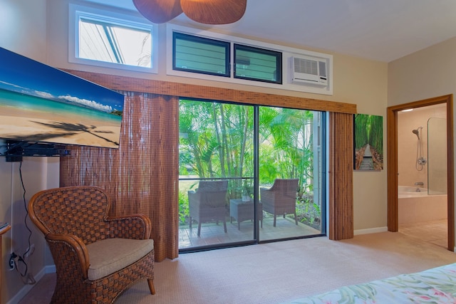 bedroom featuring ceiling fan, connected bathroom, access to outside, a wall mounted AC, and light colored carpet