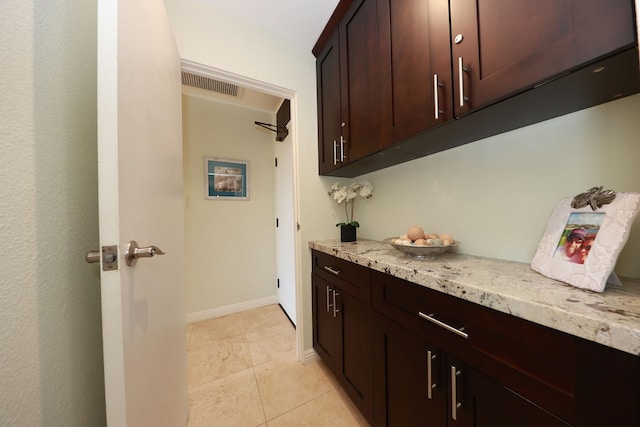 interior space with light tile patterned floors