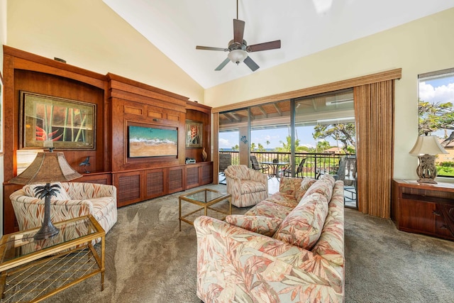 carpeted living room with ceiling fan and high vaulted ceiling