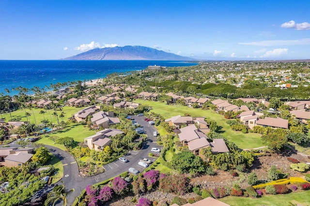 bird's eye view with a water and mountain view