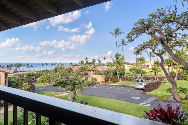 balcony featuring a water view