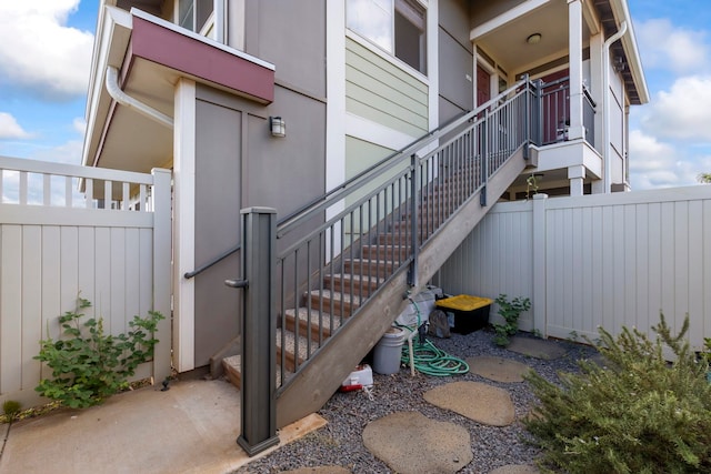 exterior space with a patio and a balcony