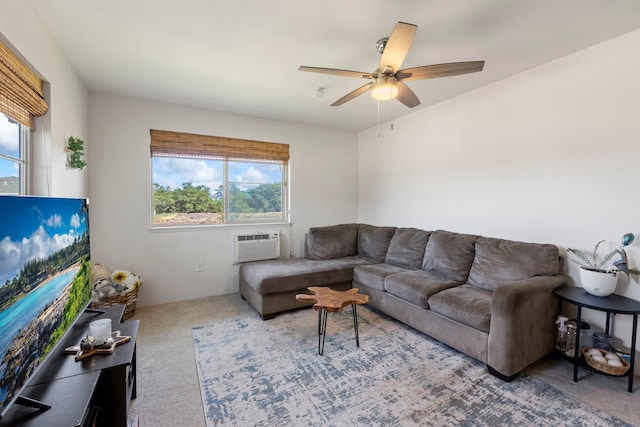 carpeted living room with ceiling fan, a wall mounted AC, and a healthy amount of sunlight