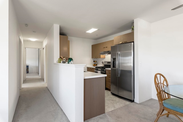 kitchen featuring light colored carpet, appliances with stainless steel finishes, and ventilation hood