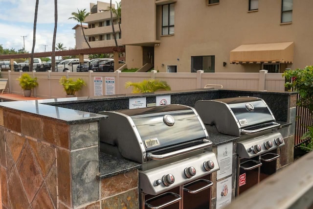 30 Hauoli St Unit 212, Wailuku, HI 96793 - view of patio / terrace with a grill and fence