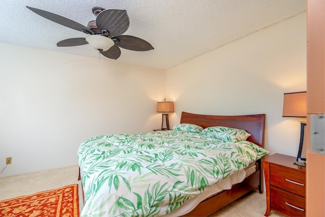 30 Hauoli St Unit 212, Wailuku, HI 96793 - bedroom featuring carpet, a textured ceiling, and ceiling fan