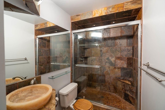 30 Hauoli St Unit 212, Wailuku, HI 96793 - full bathroom with a sink, a shower stall, and toilet