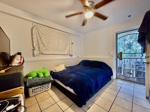 bedroom featuring light tile patterned floors and ceiling fan