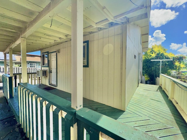 view of side of home featuring cooling unit