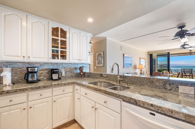 4401 Lower Honoapiilani Rd Unit A-103, Lahaina, HI 96761 - kitchen featuring a sink, white dishwasher, ceiling fan, light stone countertops, and crown molding