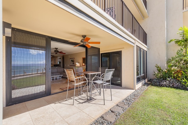 view of patio with ceiling fan