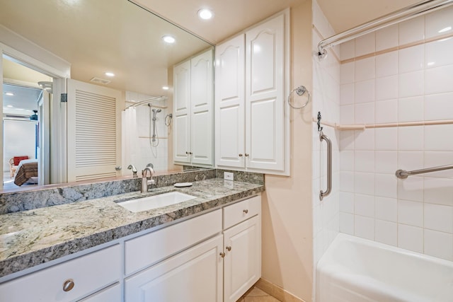 4401 Lower Honoapiilani Rd Unit A-103, Lahaina, HI 96761 - ensuite bathroom featuring vanity, recessed lighting, shower / bath combo, and baseboards