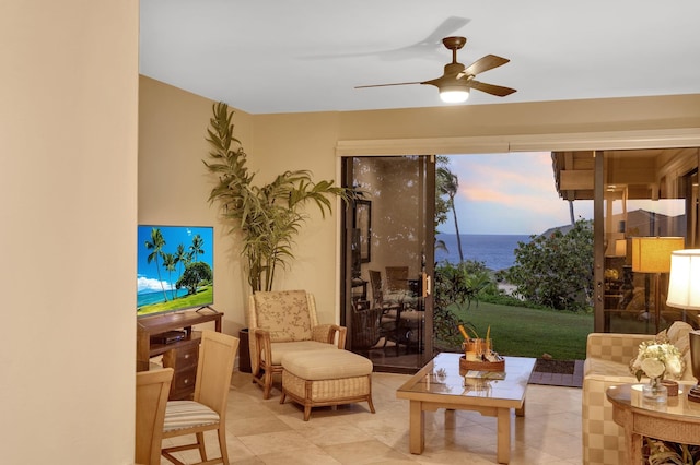 living area featuring ceiling fan