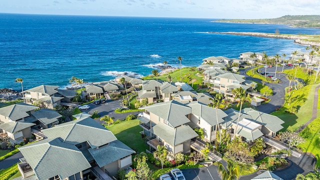 bird's eye view featuring a water view and a residential view