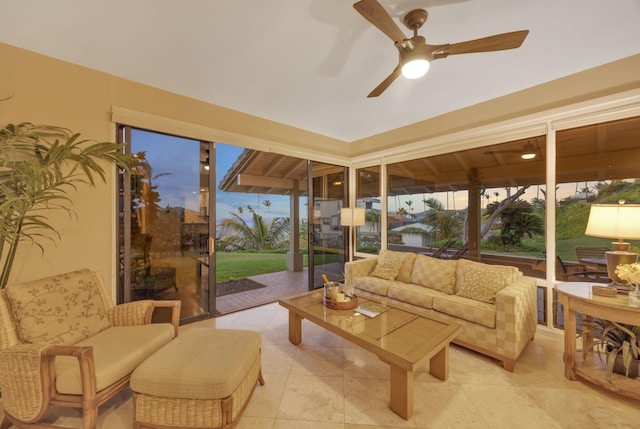 sunroom / solarium with ceiling fan