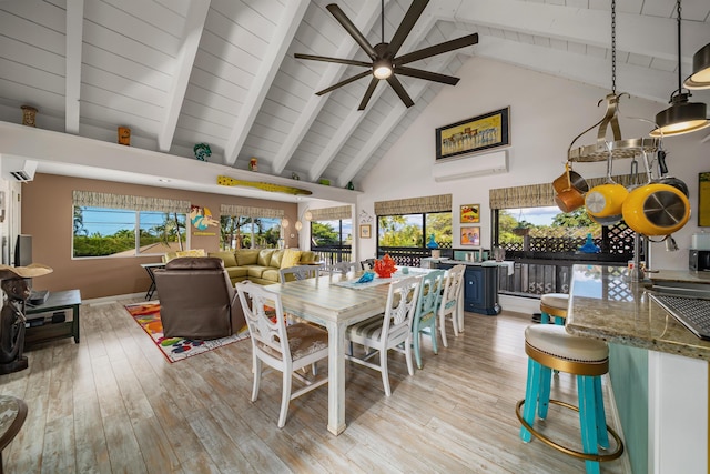 dining area featuring beam ceiling, ceiling fan, high vaulted ceiling, and light hardwood / wood-style floors