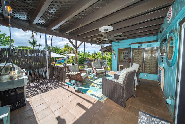 view of patio featuring outdoor lounge area and ceiling fan