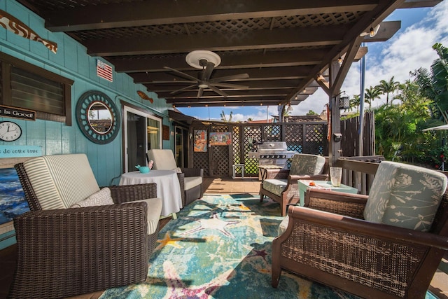 view of patio with outdoor lounge area, grilling area, and ceiling fan