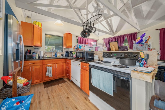 kitchen featuring lofted ceiling with beams, white appliances, sink, and light hardwood / wood-style flooring