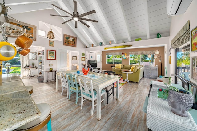 dining area with a wealth of natural light, a wall unit AC, ceiling fan, high vaulted ceiling, and beamed ceiling