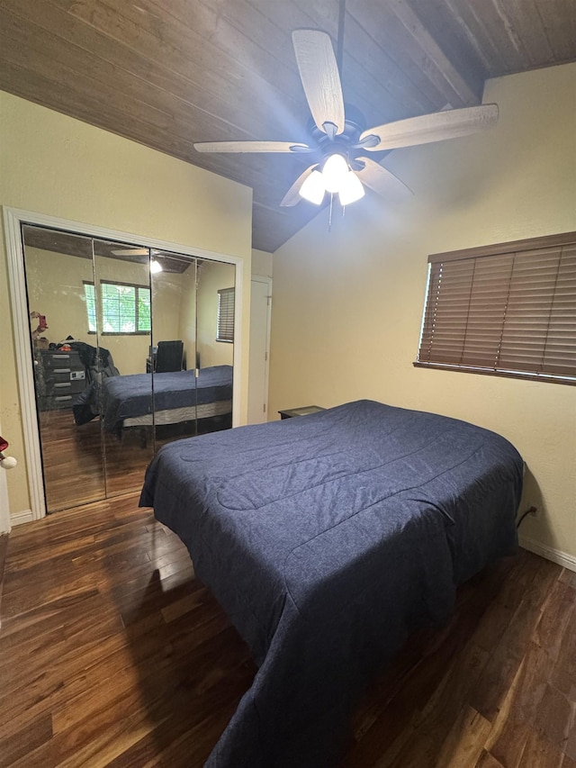 bedroom featuring a closet, wood finished floors, baseboards, wood ceiling, and a ceiling fan