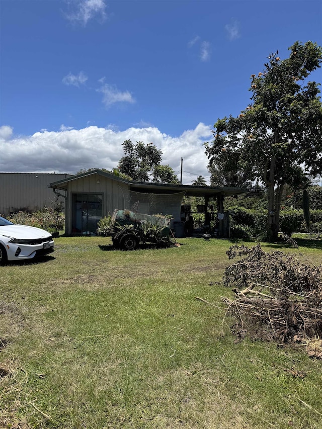 view of yard with a carport