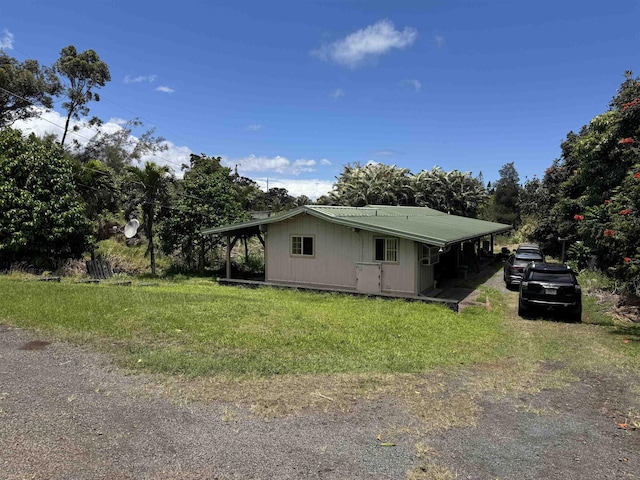 80 Alekanekelo Pl, Haiku, HI 96708 - view of property exterior featuring a yard and driveway