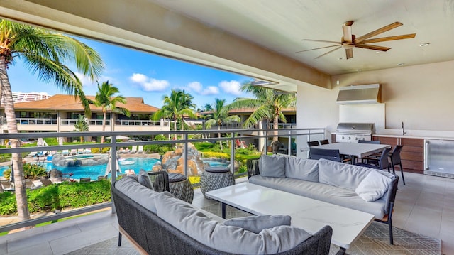 view of patio featuring an outdoor living space, ceiling fan, exterior kitchen, and grilling area