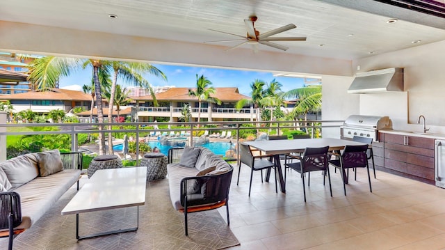 view of patio featuring an outdoor hangout area, ceiling fan, sink, exterior kitchen, and grilling area