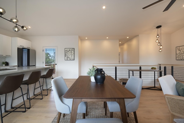 dining area featuring recessed lighting, ceiling fan, and light wood-style flooring