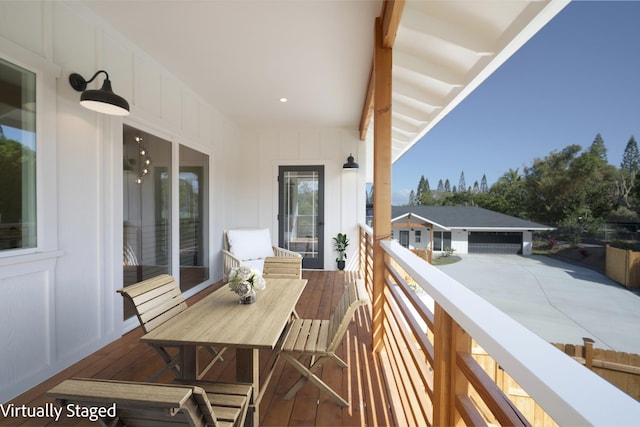 balcony featuring outdoor dining space