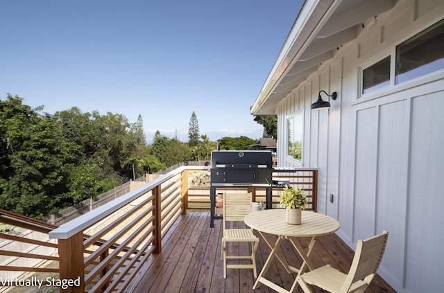 wooden deck with area for grilling