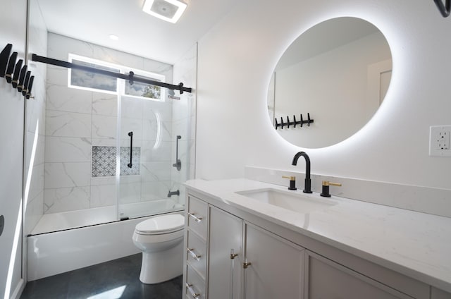 full bath featuring toilet, combined bath / shower with glass door, and vanity