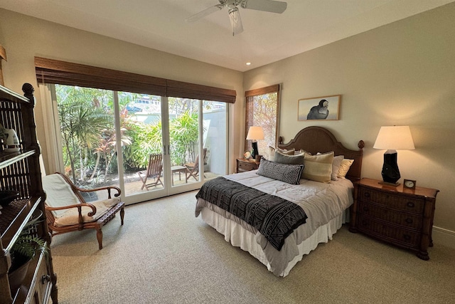 bedroom with access to exterior, light carpet, and ceiling fan