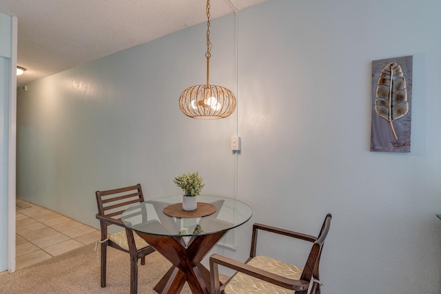 view of carpeted dining room