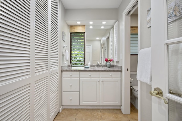 3300 Wailea Alanui Dr Unit 52D, Kihei, HI 96753 - bathroom with toilet, tile patterned floors, and vanity
