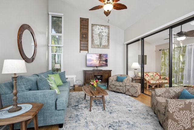 3300 Wailea Alanui Dr Unit 52D, Kihei, HI 96753 - living area with ceiling fan, wood finished floors, plenty of natural light, and lofted ceiling