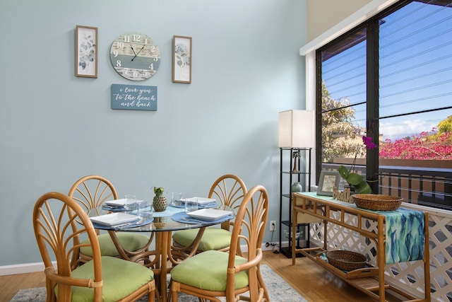 3300 Wailea Alanui Dr Unit 52D, Kihei, HI 96753 - dining space featuring wood finished floors and baseboards