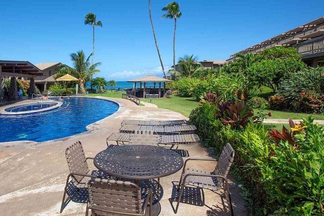 view of swimming pool with a gazebo, a yard, and a patio