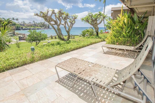 view of patio / terrace featuring a water view