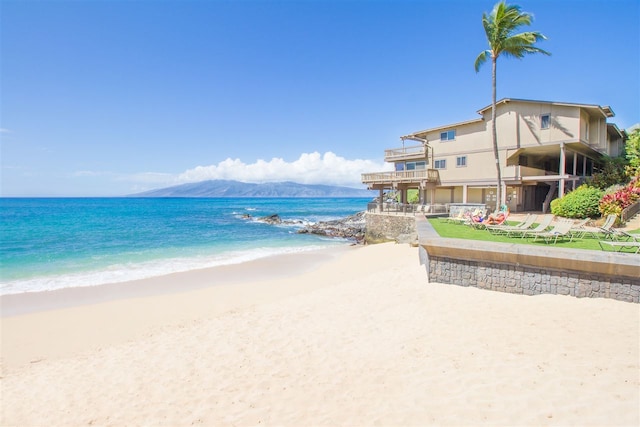 property view of water featuring a beach view