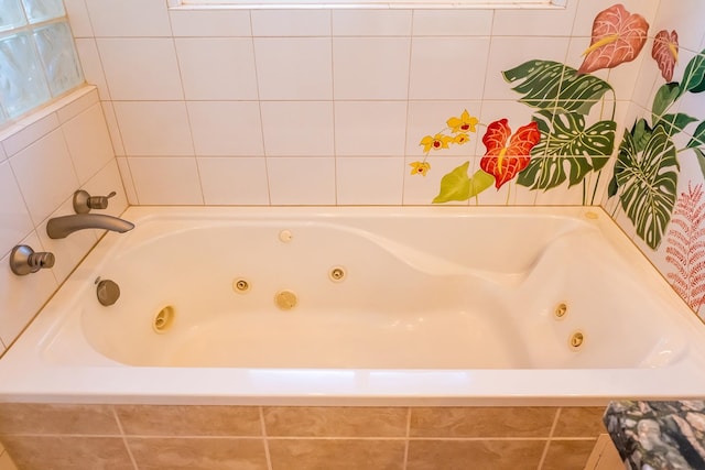 bathroom with tiled tub