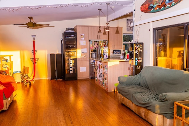 interior space featuring vaulted ceiling with beams, ceiling fan, and dark hardwood / wood-style flooring